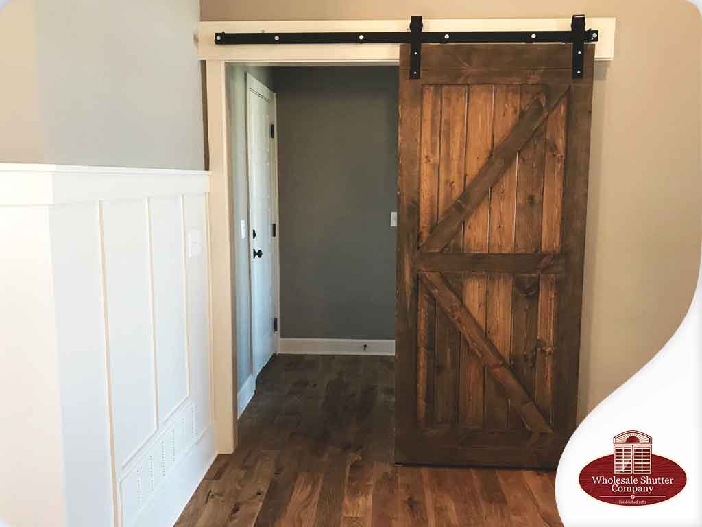 How to Hang a Barn Door With Trim?