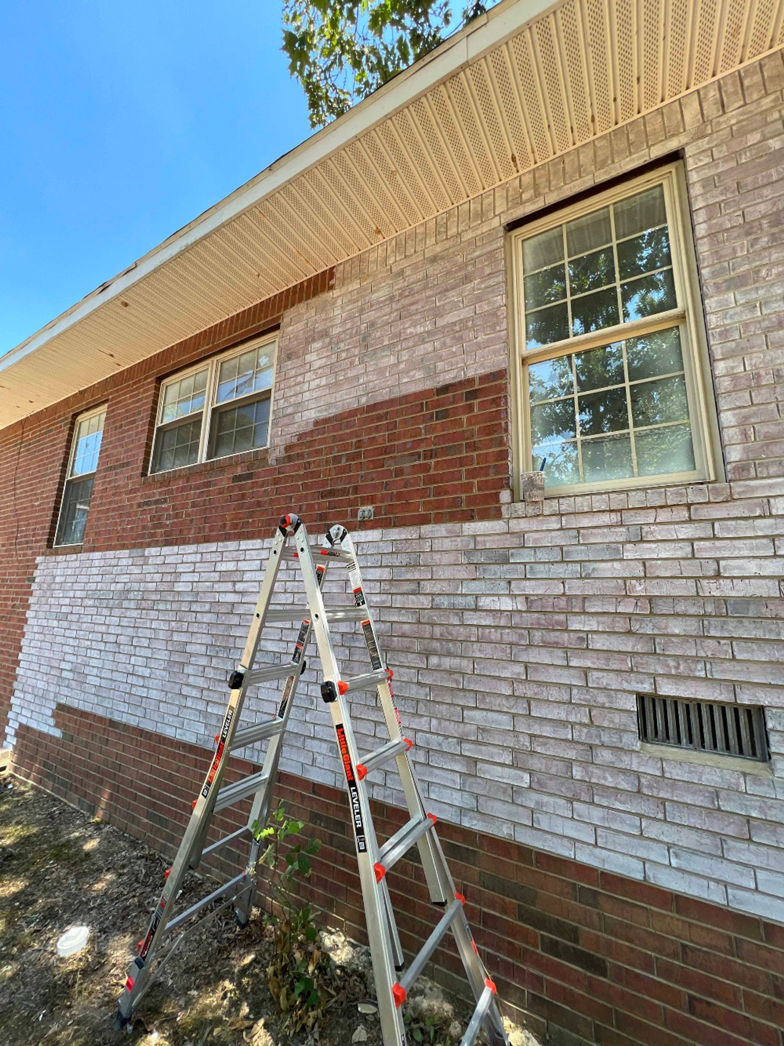 how to stain a brick house?