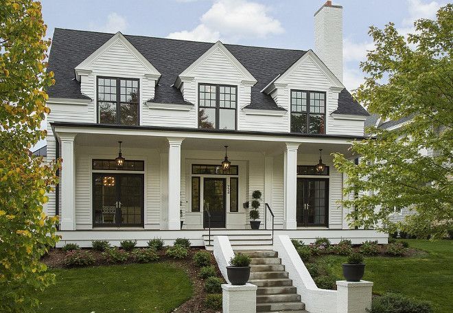 White Farm House with Black Shutters: Classic Elegance in Design